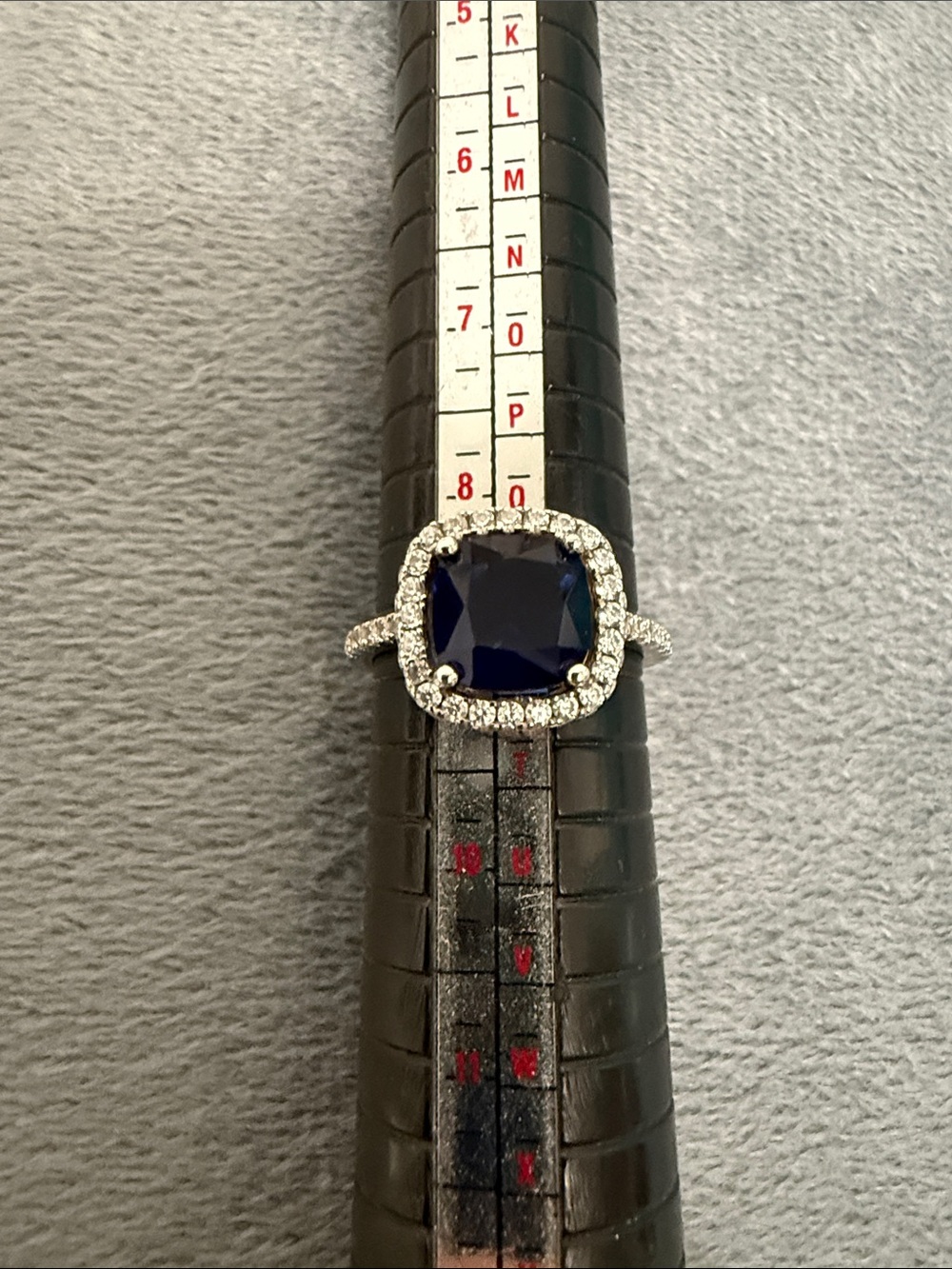 Elegant Navy Cushion Halo Ring with Clear Pave Accents